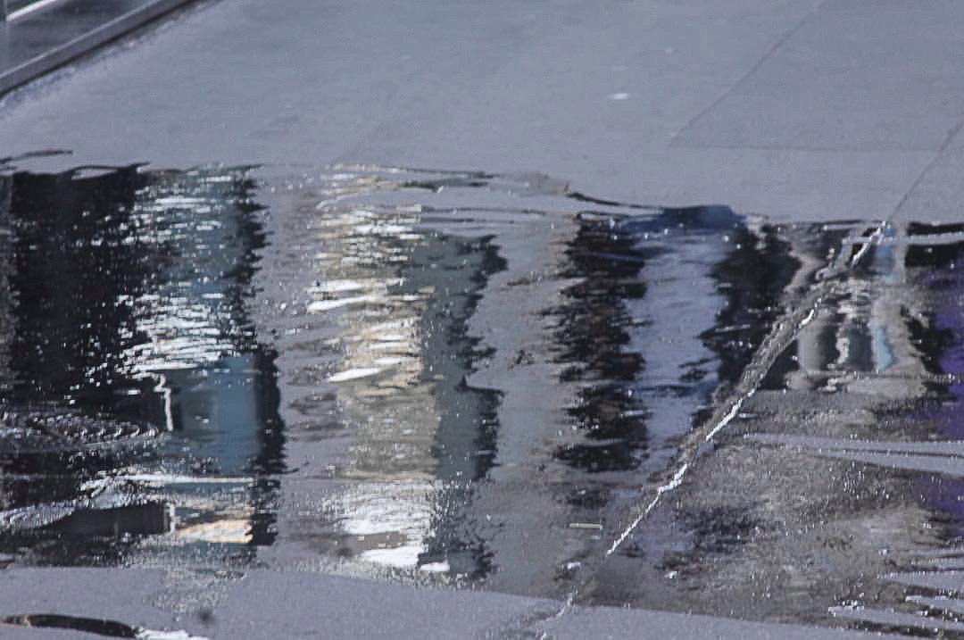 Mirror Paris. Puddle.